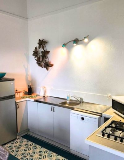 Equipped kitchen in villa for rent at Black Rock Rarotonga